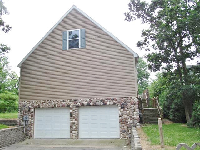 10771 Woodbrook Dr, Cement City, MI 49233 