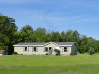 6519 N Hillman Road, Six Lakes, MI 48886 