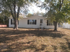 107 S LYNE ST, RAYMORE, MO 64083 
