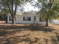107 S LYNE ST, RAYMORE, MO 64083 