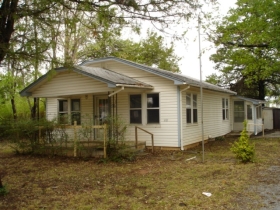 223 W LOCUST STREET, TECUMSEH, OK 74873 